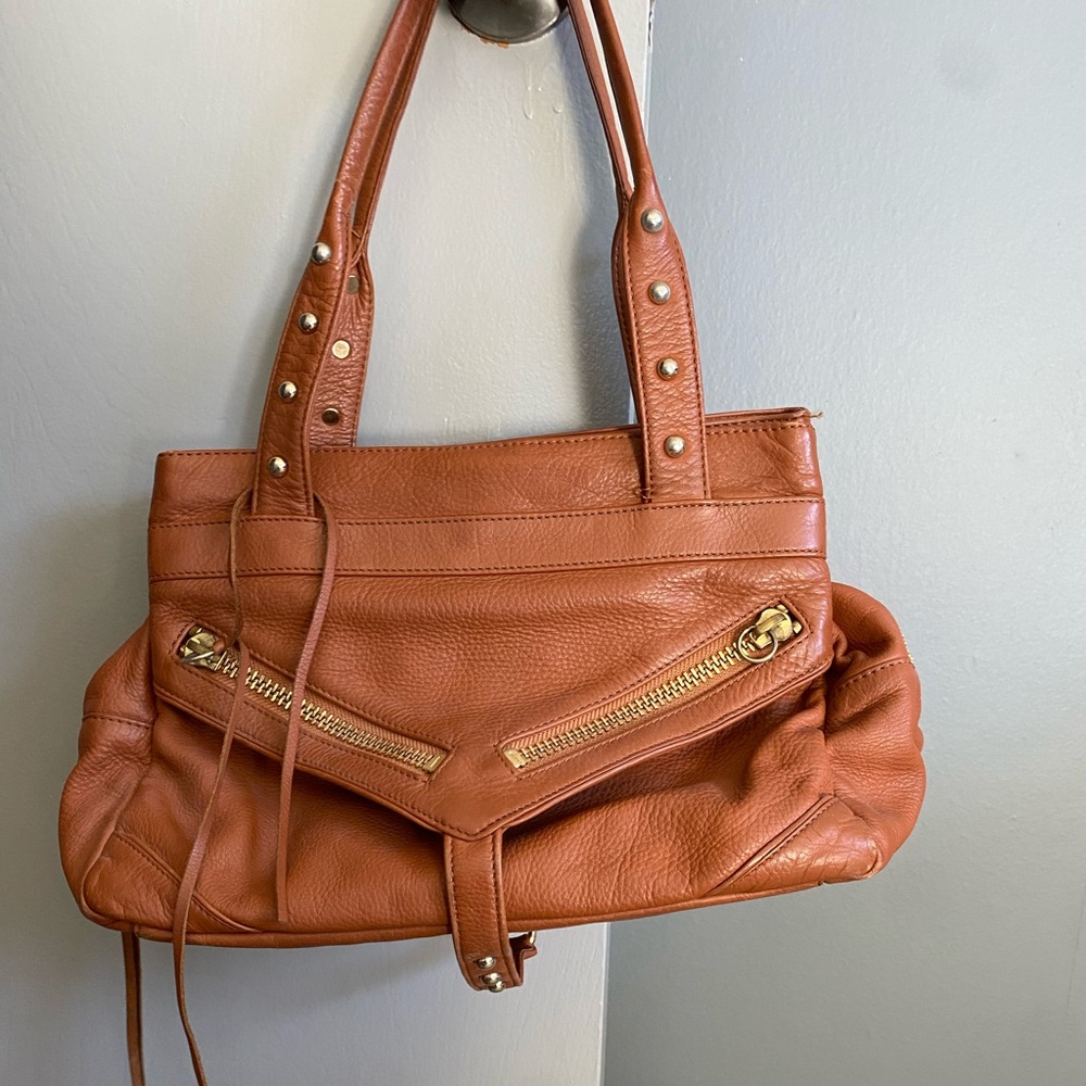 Botkier trigger bag in brown leather.